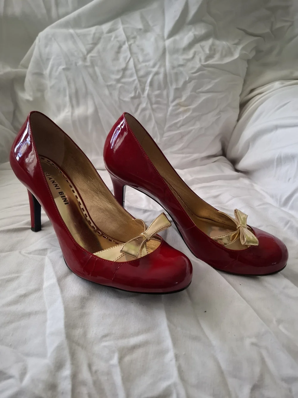 Gianni Bini Red Patent Pumps with Gold Bow Accent